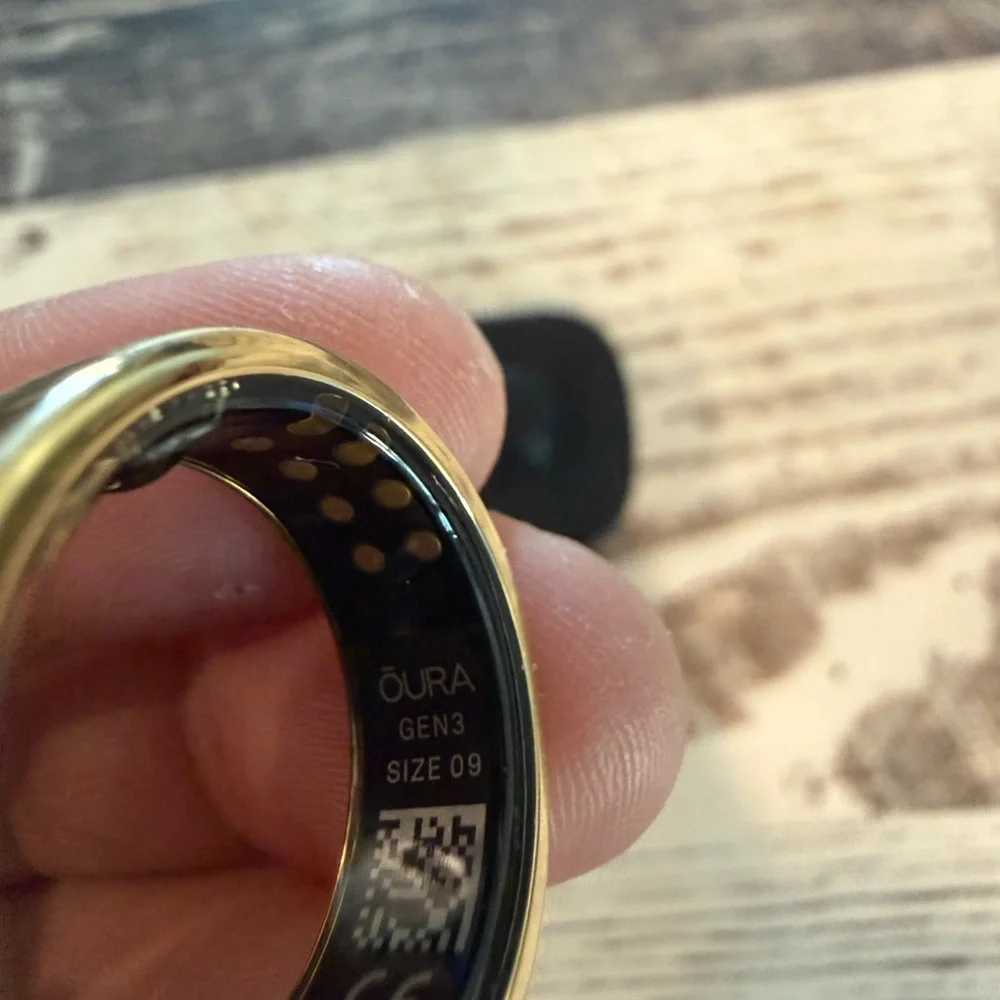 Oura Gold and Black Wearable Ring